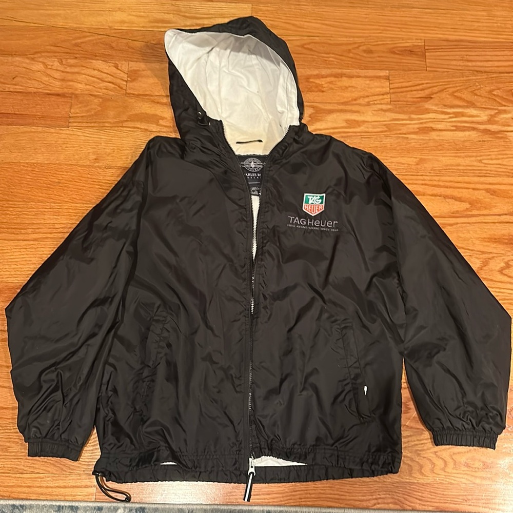 Tag Heuer Watch Co hooded black windbreaker very good condition. Size S/M